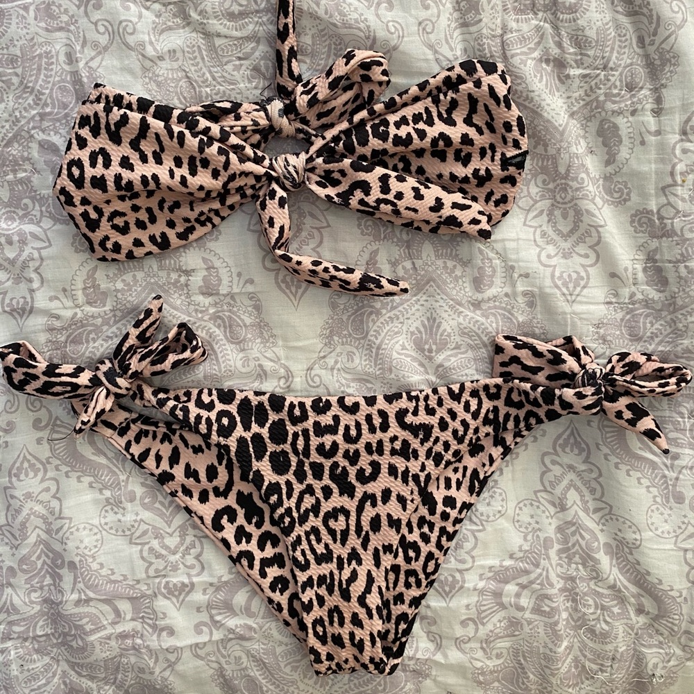 Worn with matching cheetah or black bottoms